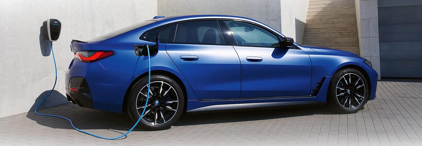 Blue 2022 BMW i4 charging 