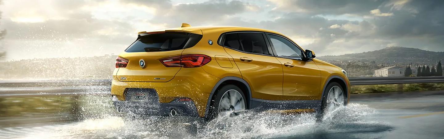 2023 BMW X2 driving in the water