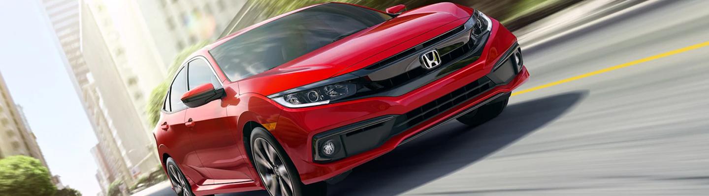 Red 2021 Honda Civic in motion