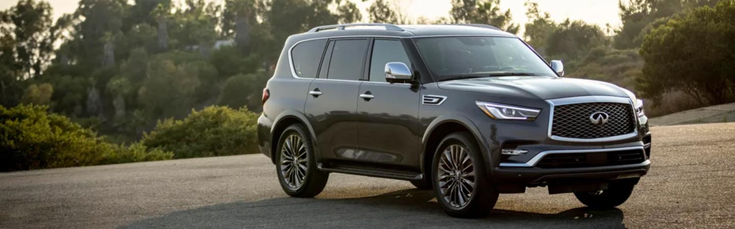 2022 INFINITI QX80 parked with trees