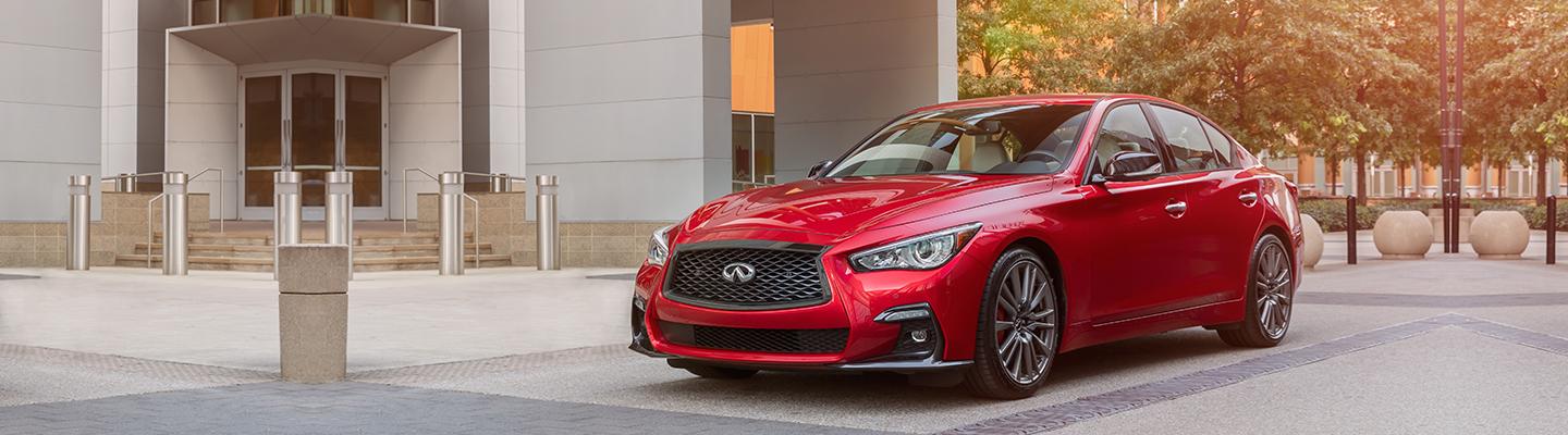 Red INFINITI Q50 Parked on RoadSide