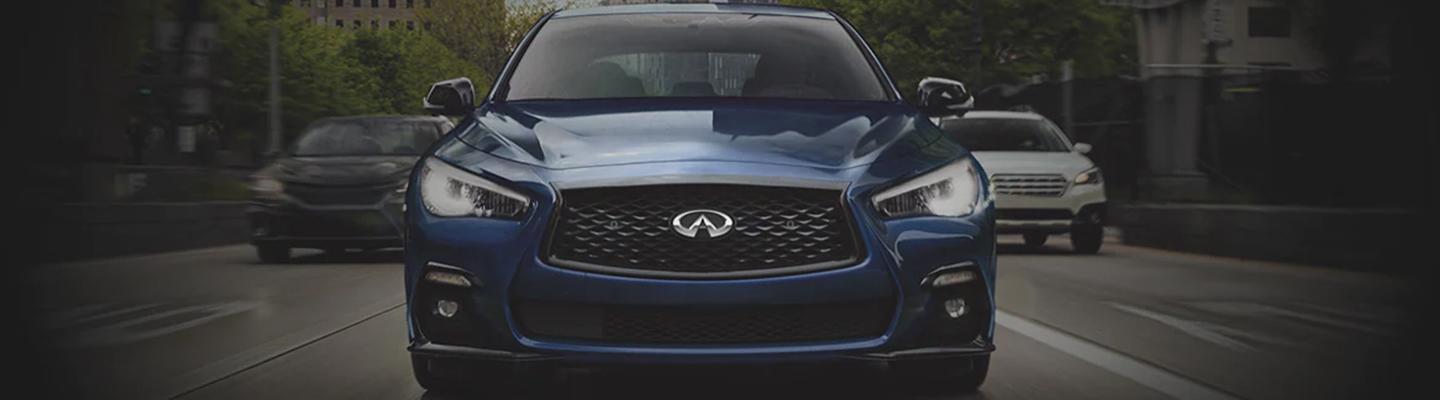 front view of a blue INFINITI Q50