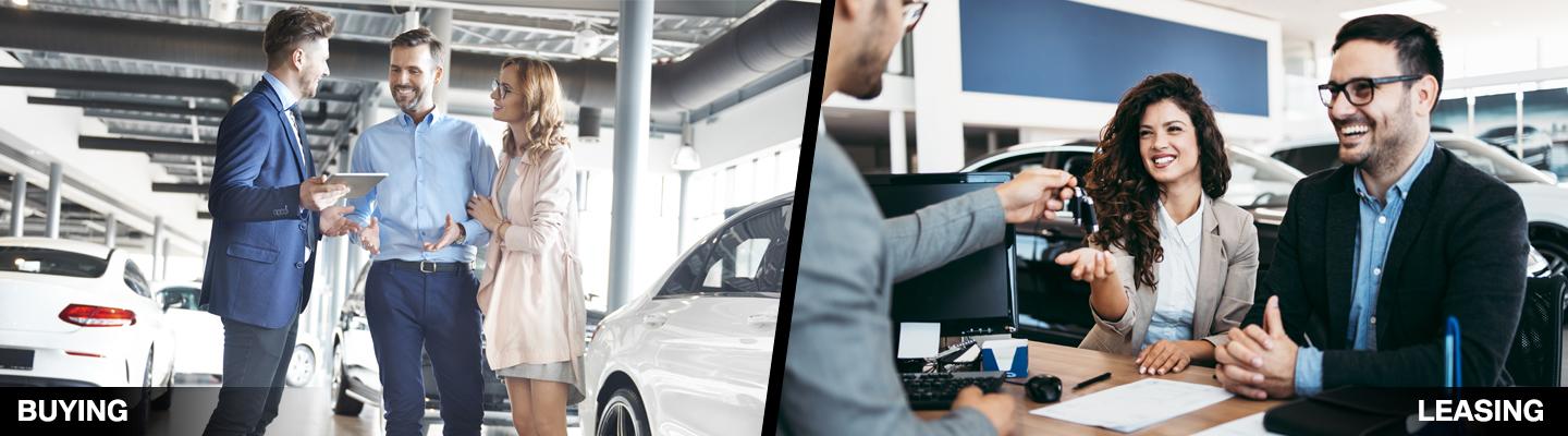 Sales person helping customers go over leasing and buying options
