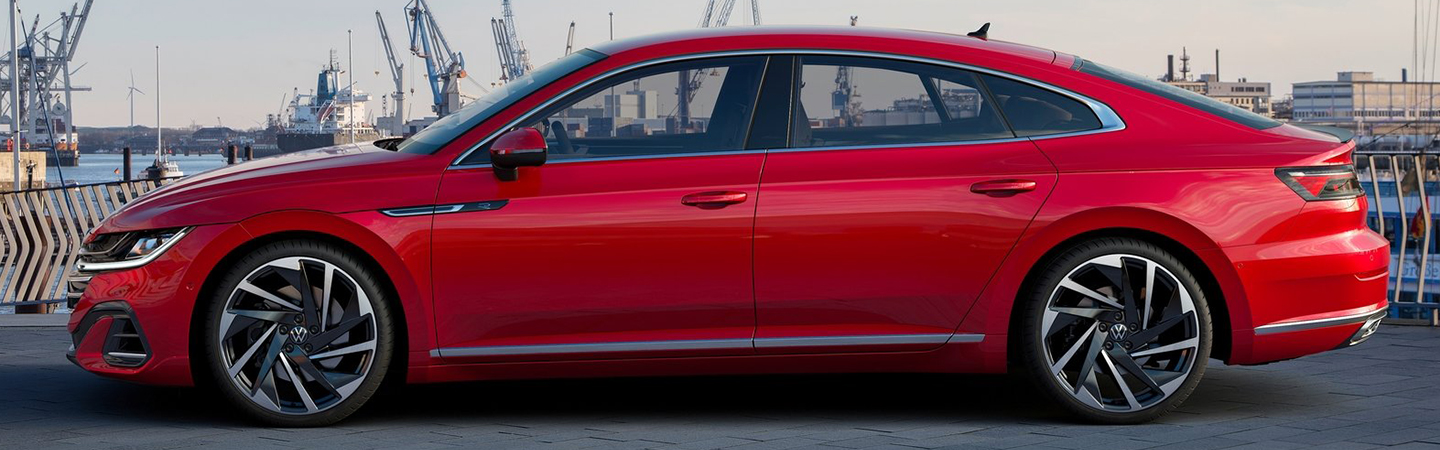 Side profile view of a red 2021 Arteon